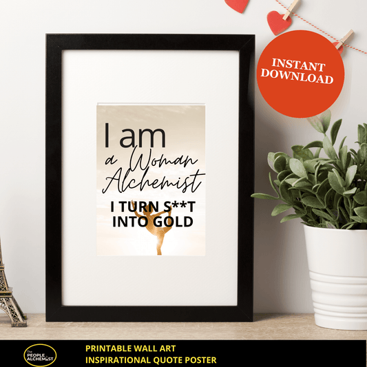 "I am a Woman Alchemist" Inspirational quote poster printable wall art ( sepia color design). Image showing a black frame against white wall next to a plant . The frame displays the inspirational quote poster. Instant download after purchase.